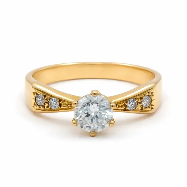 Anillo de oro para mujer 18k diseño solitario con 1 circón central y 4 circones a los lados