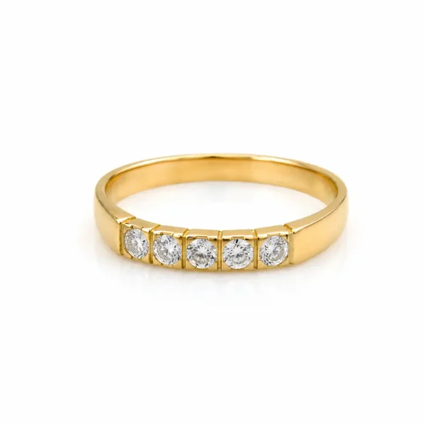Anillo de oro para mujer 18k diseño cintillo con 5 circones transparentes